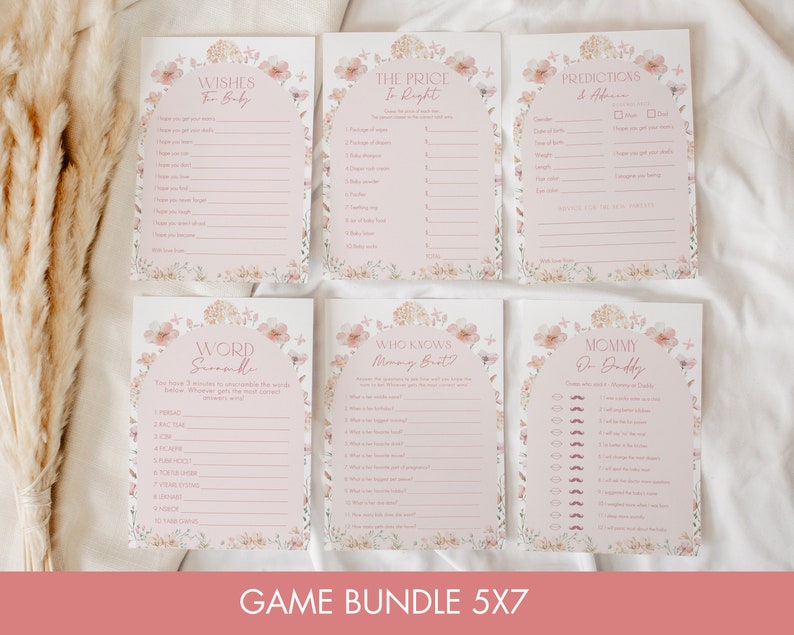 May include: A set of 5 baby shower game cards with floral designs. The games include "Wishes for Baby", "The Price is Right", "Predictions & Advice", "Word Scramble", and "Mommy or Daddy".