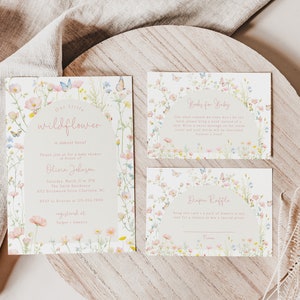 May include: Three baby shower cards with a floral design featuring butterflies and the text "One Little Wildflower is almost here", "Wishes for Baby", and "Diaper Raffle".