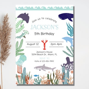 May include: An invitation to a 5th birthday party with an under the sea theme. The invitation features a lobster, a shark, an octopus, a jellyfish, and other sea creatures. The text on the invitation reads "Join us to celebrate JACKSON'S 5th Birthday, August 12, 2pm-4pm, Jackson's House, 5294 Beach Dr., Miami, FL, RSVP TO Katie at 123-456-7890."