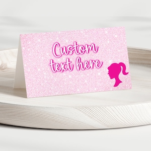 May include: Pink glitter card with the text "Custom text here" and a pink silhouette of a woman with a ponytail.
