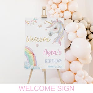May include: Welcome sign with a rainbow and a unicorn with the text "Welcome to Ayla's Birthday August 21, 2025".