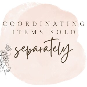 May include: A watercolor-style illustration of a pink circle with the text "COORDINATING ITEMS SOLD SEPARATELY" in brown text. A black and white floral illustration is on the left side of the circle.