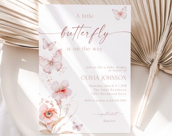 May include: A pink and white baby shower invitation with a butterfly design. The invitation reads "A little butterfly is on the way" and includes the name Olivia Johnson, the date and time of the shower, and the location. The invitation also includes the text "Registered at Babylist".