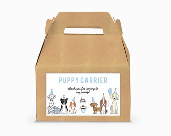 May include: Brown cardboard box with a handle, labeled "Puppy Carrier". The label has a blue and white design with a line of cartoon dogs wearing party hats. The text on the label reads "Thank you for coming to my pawty! Love, Bodhi!"