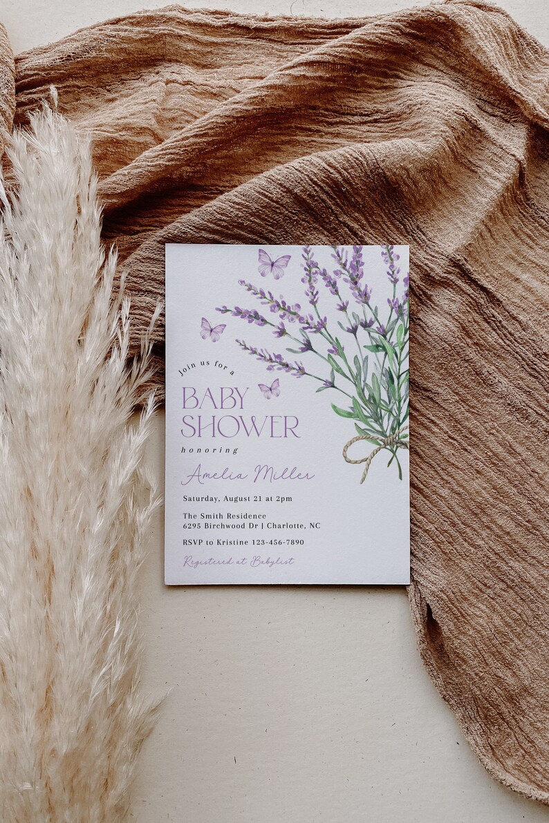 May include: A lavender-themed baby shower invitation with butterflies and the text "Join us for a Baby Shower honoring Amelia Miller. Saturday, August 21 at 2pm. The Smith Residence 6295 Birchwood Dr | Charlotte, NC. RSVP to Kristine 123-456-7890. Registered at Babylist."