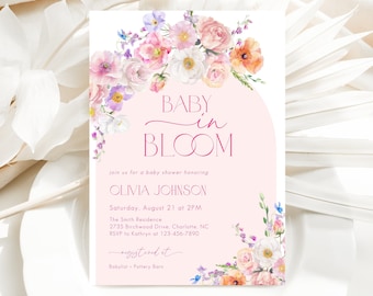 May include: A pink and white baby shower invitation with floral illustrations. The text reads "Baby in Bloom" and includes details for the event, including the date, time, location, and RSVP information.