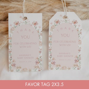 May include: Two pink and white favour tags with floral designs and the text "Thank You for Celebrating with Us!" and "Hannah's Baby Shower August 21, 2024".