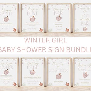 May include: A set of ten printable baby shower signs featuring a winter theme. The signs are decorated with a pink and white color scheme and feature illustrations of a mug of hot chocolate. The signs include titles such as "Diaper Raffle", "Diaper Hunt", "Hot Chocolate Bar", "Guestbook", and "Babies Are Sweet".