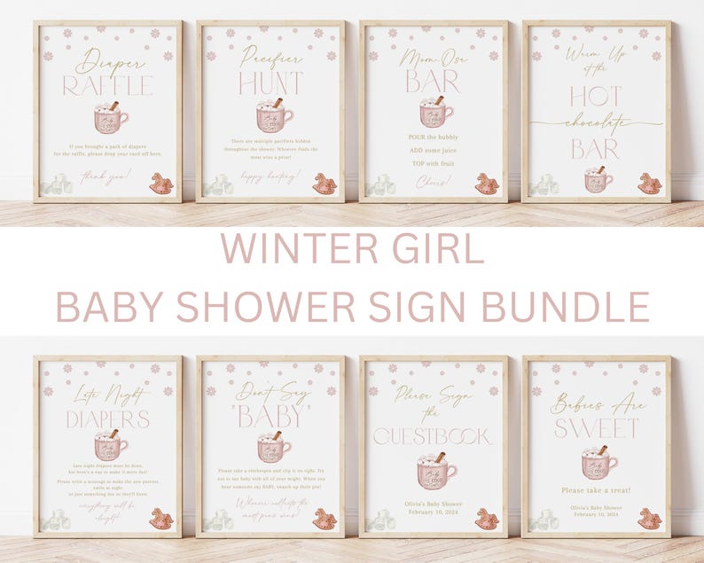 May include: A set of ten printable baby shower signs featuring a winter theme. The signs are decorated with a pink and white color scheme and feature illustrations of a mug of hot chocolate. The signs include titles such as "Diaper Raffle", "Diaper Hunt", "Hot Chocolate Bar", "Guestbook", and "Babies Are Sweet".