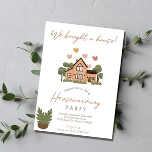 May include: A housewarming party invitation with a cartoon illustration of a house with a brown roof and a yellow door. The text reads "We bought a house!" and "Please join us for a Housewarming Party". The invitation includes the date, time, address, and contact information.