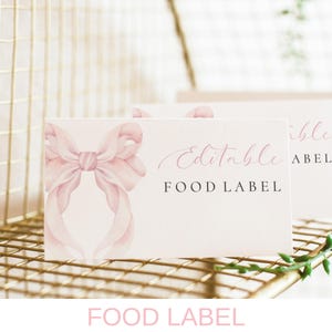 May include: Pink and white food labels with a watercolor bow design. The text "Editable Food Label" is printed on the label.