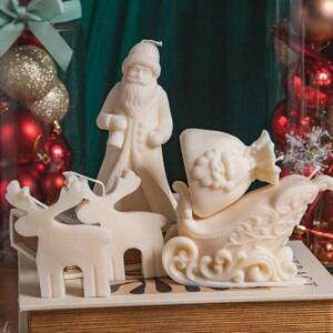 Santa Claus Sled Soy Wax Candle: Holiday Christmas Decor