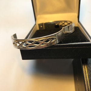 Hinged Celtic knotwork bangle bracelet