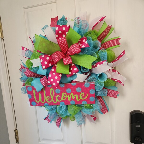 Welcome spring and summer wreath with mini bows all through the wreath with bright colors and wood sign.  low prices and FREE Shipping