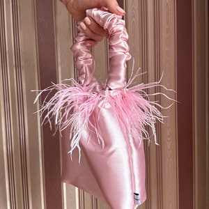 Pink feather clutch