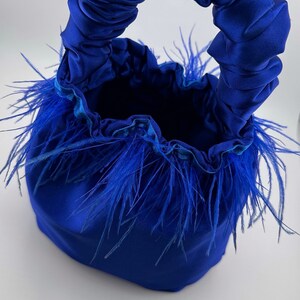 Royal blue satin feather scrunchie bag