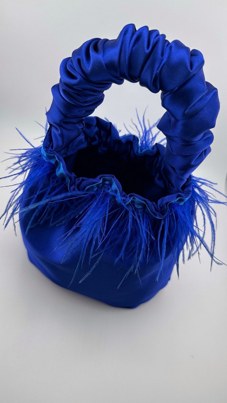 Royal blue satin feather scrunchie bag