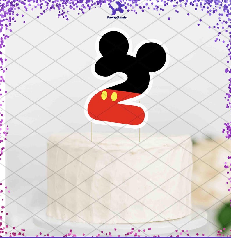 May include: A cake topper in the shape of the number 2, designed with a black Mickey Mouse head and a red body with yellow accents. The topper is on a white frosted cake. The text "PawtyReady" is in the top right corner.