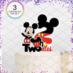 May include: A cake topper featuring Mickey Mouse with a peace sign, the number 2, and the words "Two-dles." The topper is black, red, and white. The text "3 toppers kit per qty" is in a circle.