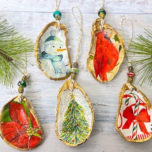 Oyster Shell Christmas Ornament With Glass Beads.  Choose from a Snowman, Candy Cane, Christmas Tree, Poinsettia or Cardinal.