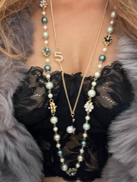 Chanel Vintage Faux Pearl Necklace, $1,293, farfetch.com