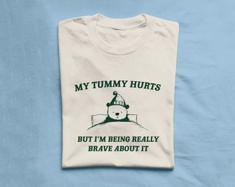 My Tummy hurts But I&#39;m being really brave about it Unisex Heavy Cotton Tee