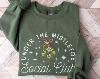 Kersttrui 'Under The Mistletoe Social Club': hemels geverfd botanisch sweatshirt met ronde hals