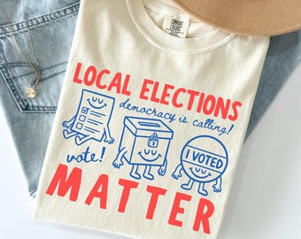 Camiseta Comfort Colors 'Las elecciones locales importan': Camiseta divertida con estilo retro de dibujos para votar