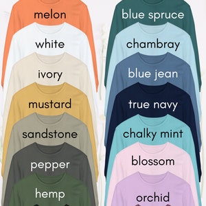 May include: A color chart of long-sleeve shirts in various colors, including melon, white, ivory, mustard, sandstone, pepper, hemp, black, blue spruce, chambray, blue jean, true navy, chalky mint, blossom, orchid, and berry.