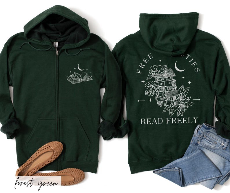 May include: Forest green zip-up hoodie with a white graphic of an open book and crescent moon on the front. The back features a stack of books, flowers, and the text "FREE SOCIETIES READ FREELY". The hoodie has a hood and front pockets.
