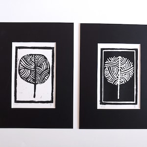 Two original prints of linocut Trees black and white