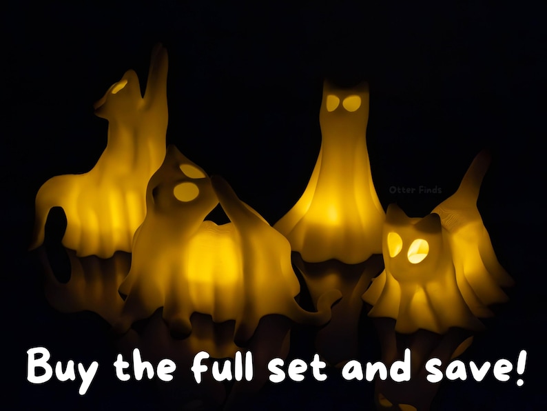 Pode incluir: Quatro figuras de fantasmas em forma de gato, em tom esbranqui&ccedil;ado, com olhos e corpos amarelos iluminados contra um fundo preto. As figuras apresentam v&aacute;rias poses, incluindo sentadas e esticadas. O texto "Buy the full set and save!" est&aacute; na parte inferior.