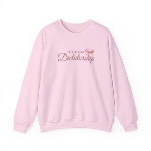 It's Giving Dictatorship Sweatshirt, Coquette Political Humor, Election Protest Apparel Light Pink