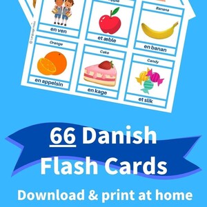 May include: A set of 66 colorful flashcards with illustrations and Danish words for learning basic vocabulary. The cards feature images of a tomato, head, ear, banana, apple, orange, cake, candy, and friends. The text on the cards includes words like "et hoved", "en banan", "et æble", and "en kage".