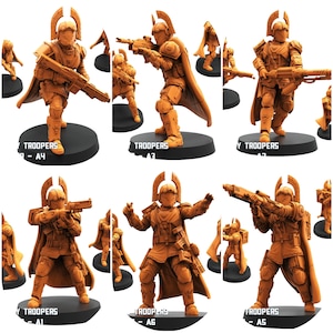 Op de afbeelding: Meerdere oranje-bruine miniatuurbeeldjes van futuristische soldaten, elk geposeerd met wapens en pantser. De beeldjes staan op zwarte cirkelvormige bases, met het woord "TROOPERS" en nummers erop gedrukt. Het algemene thema is sciencefiction of fantasy.