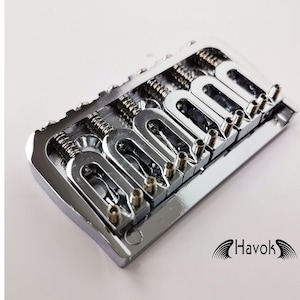 May include: Chrome-plated six-string bass guitar bridge with adjustable saddles and individual string height adjustment.