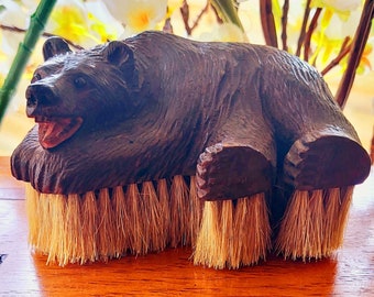 Great wooden carved black forest bear, Swizerland ca. 19th Black Forest Bear Carved Reclining Bear Clothes Erzgebirge Brush