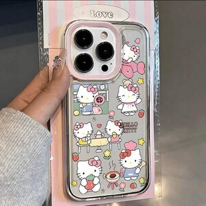 May include: Clear phone case featuring Hello Kitty illustrations in various poses with pink accents. The case has a pink border around the camera and the text "Hello Kitty". The packaging has the word "Love" at the top.