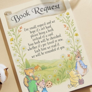 May include: A cream-colored book with the words "Book Request" in elegant script. The book features illustrations of a bear, mouse, rabbit, and Winnie the Pooh characters. Text on the page requests a book instead of a card.