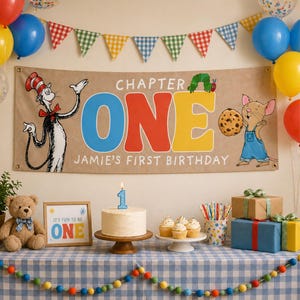 May include: A birthday party scene with a banner that reads "Chapter One Jamie's First Birthday." The banner features cartoon characters and the word "ONE" in large, colorful letters. A cake with a number one candle, cupcakes, gifts, and balloons complete the festive setting.