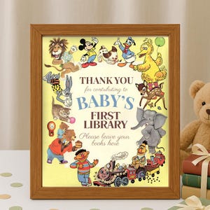 K&ouml;nnte beinhalten: Ein gerahmter Druck mit gelbem Hintergrund und verschiedenen Zeichentrickfiguren, darunter Micky Maus und Big Bird. Der Text lautet: &bdquo;DANKE f&uuml;r Ihren Beitrag zur ERSTEN BIBLIOTHEK DES BABYS. Bitte lassen Sie Ihre B&uuml;cher hier.&ldquo;