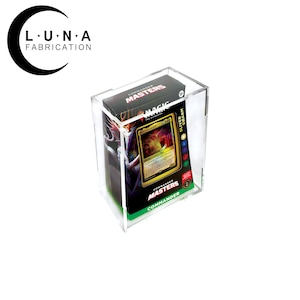 May include: A clear acrylic display case with a Magic: The Gathering Commander Masters card inside. The card is a foil version of the Silver-Cursed  Swarm card. The card is in a green, black, and gold color scheme.