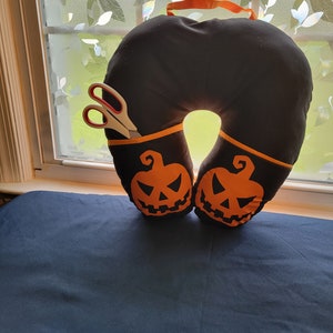 Halloween theme orange pumpkin neck pillow with pockets