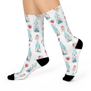 May include: White socks with a pattern of gnomes wearing doctor's coats, stethoscopes, and holding red vials. The gnomes are wearing blue hats and have white beards.
