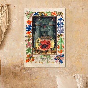 May include: A rectangular wall art print featuring a medieval-style illustration of a monstrous creature with a wide, gaping red mouth. The central image is surrounded by a colourful, ornate floral border in shades of blue, green, and orange.