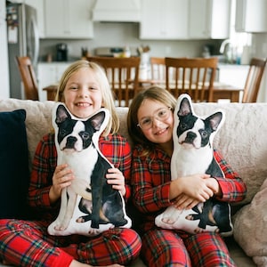 May include: Two custom-shaped throw pillows featuring a realistic photographic print of a black and white Boston Terrier dog. The pillows are shaped to the silhouette of the dog, showing the animal in a seated position with white chest markings.