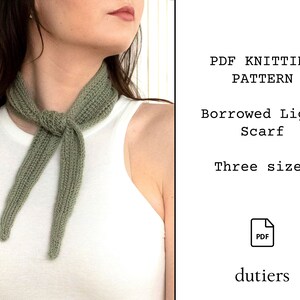 May include: A green knitted scarf tied around a person's neck. The scarf is a simple design with a knot in the front. The text on the image reads "PDF Knitting Pattern Borrowed Light Scarf Three sizes dutiers".