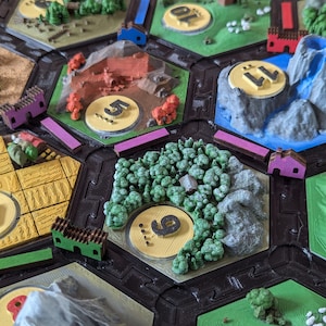 Settlers of Catan game pieces