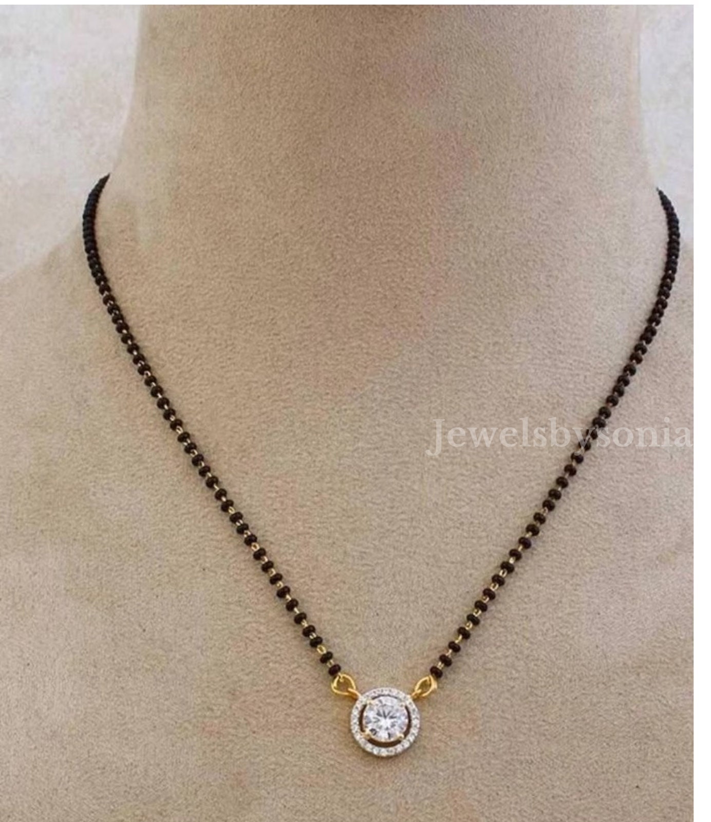 Gold simple mangalsutra designs deals