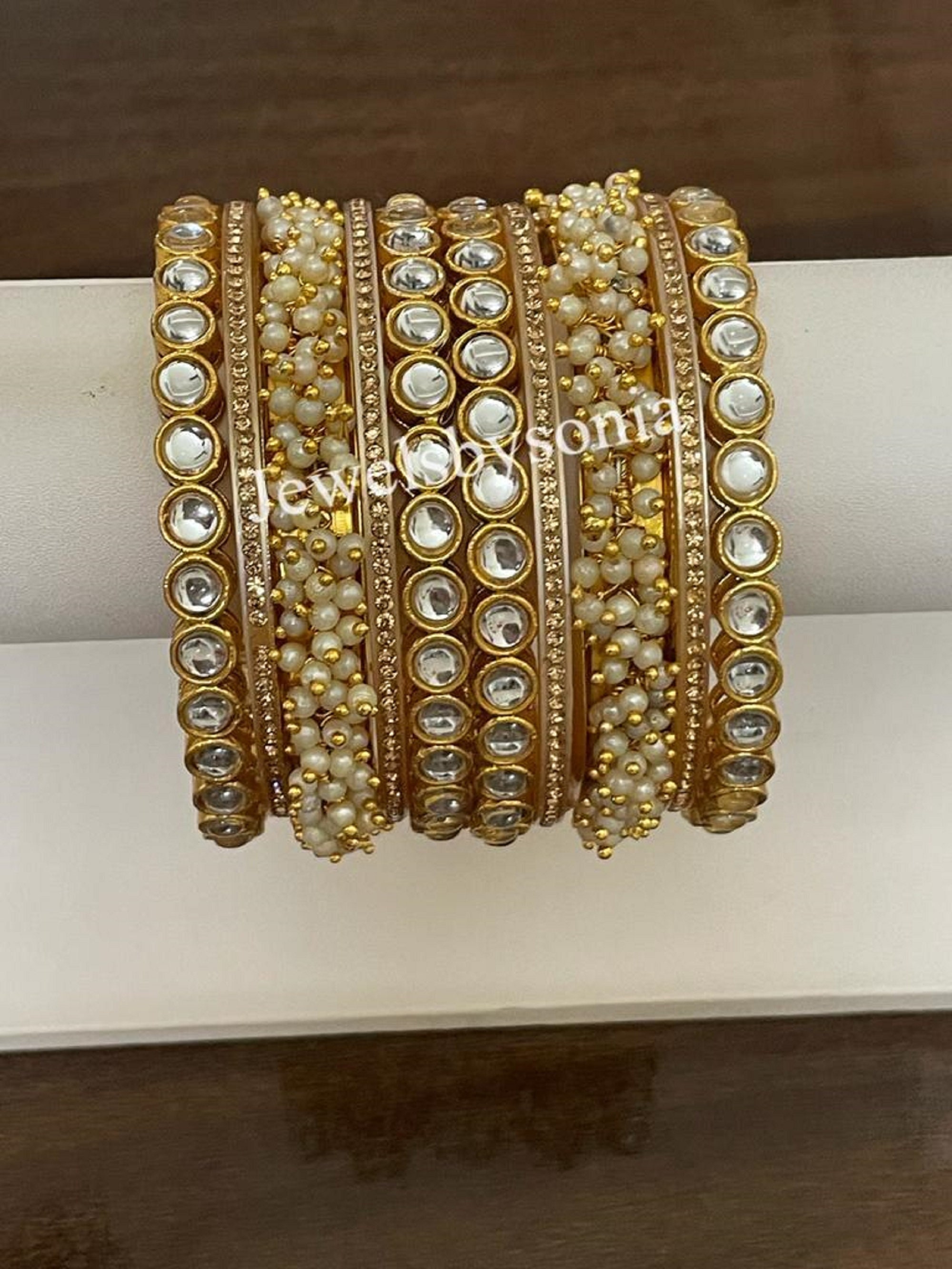 Gold kundan bangles with price deals